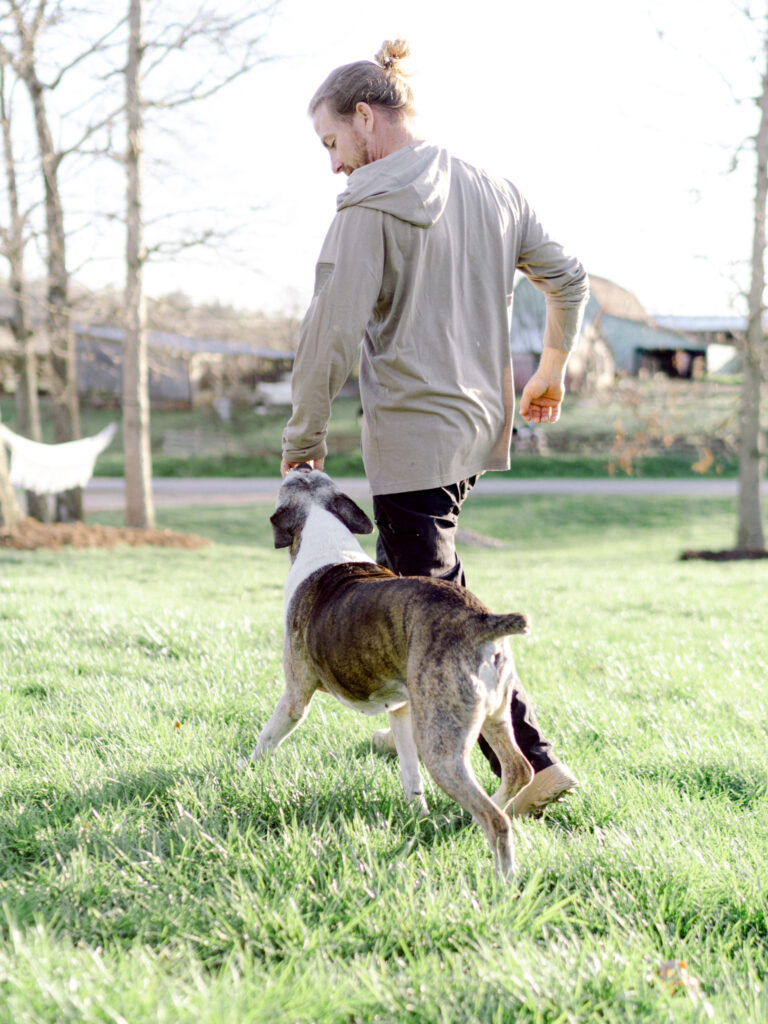 seth payne training dog in grass